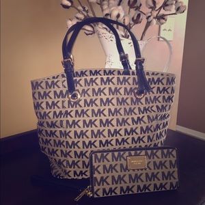 Micheal Kors Authentic handbag with wallet.